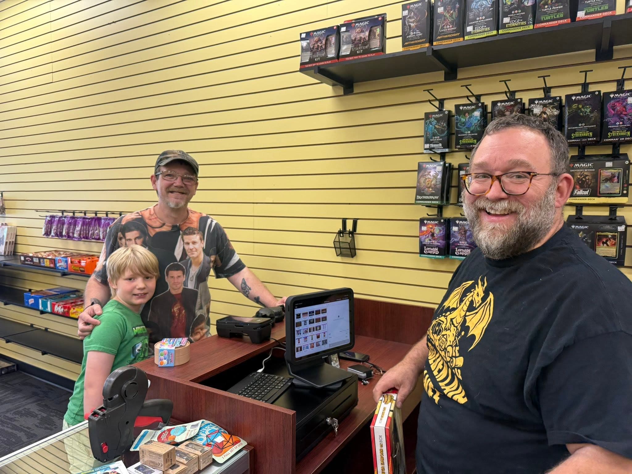 Inside Golden Lair Games with trading cards and products for sale